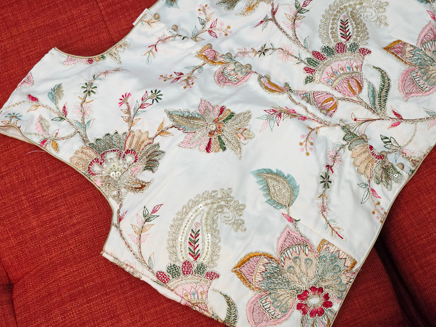 White Sleeveless Fancy Embroidered Blouse