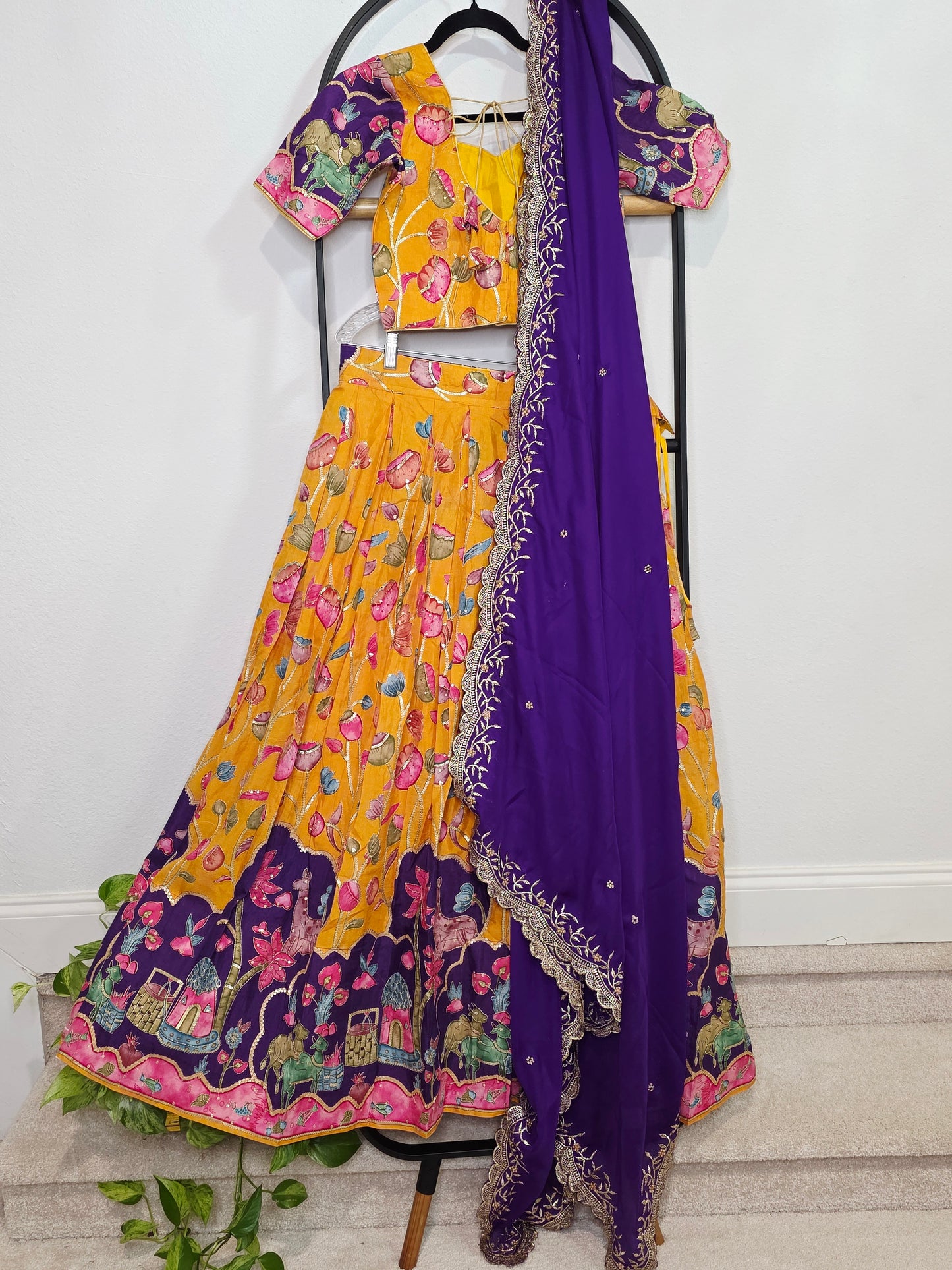 Imperial Saffron Kalamkari Munga Crepe Silk Lehenga Set with Royal Purple Cutwork Dupatta