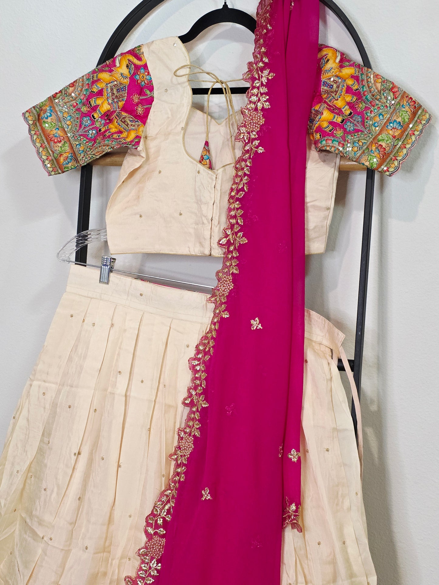 Ivory Champagne Munga Crepe Silk Lehenga with Royal Magenta Kalamkari Border & Embroidered Cutwork Dupatta