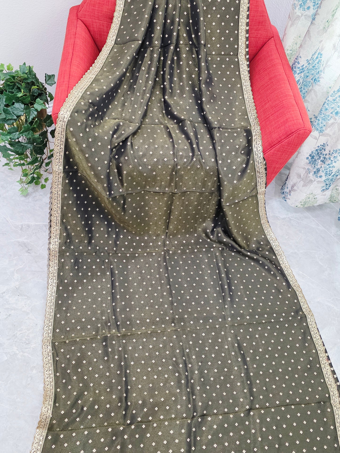Luxury olive gold tissue saree with delicate all over butta and lace border