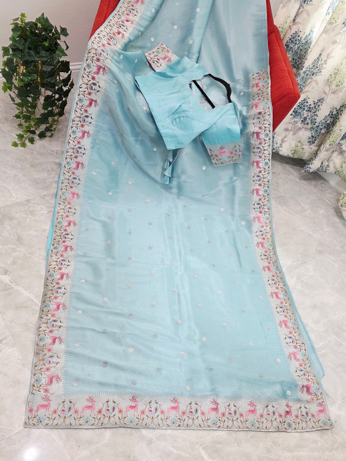 Aqua Blue Soft Tissue Silk Saree with Embroidered Border & Stitched Blouse