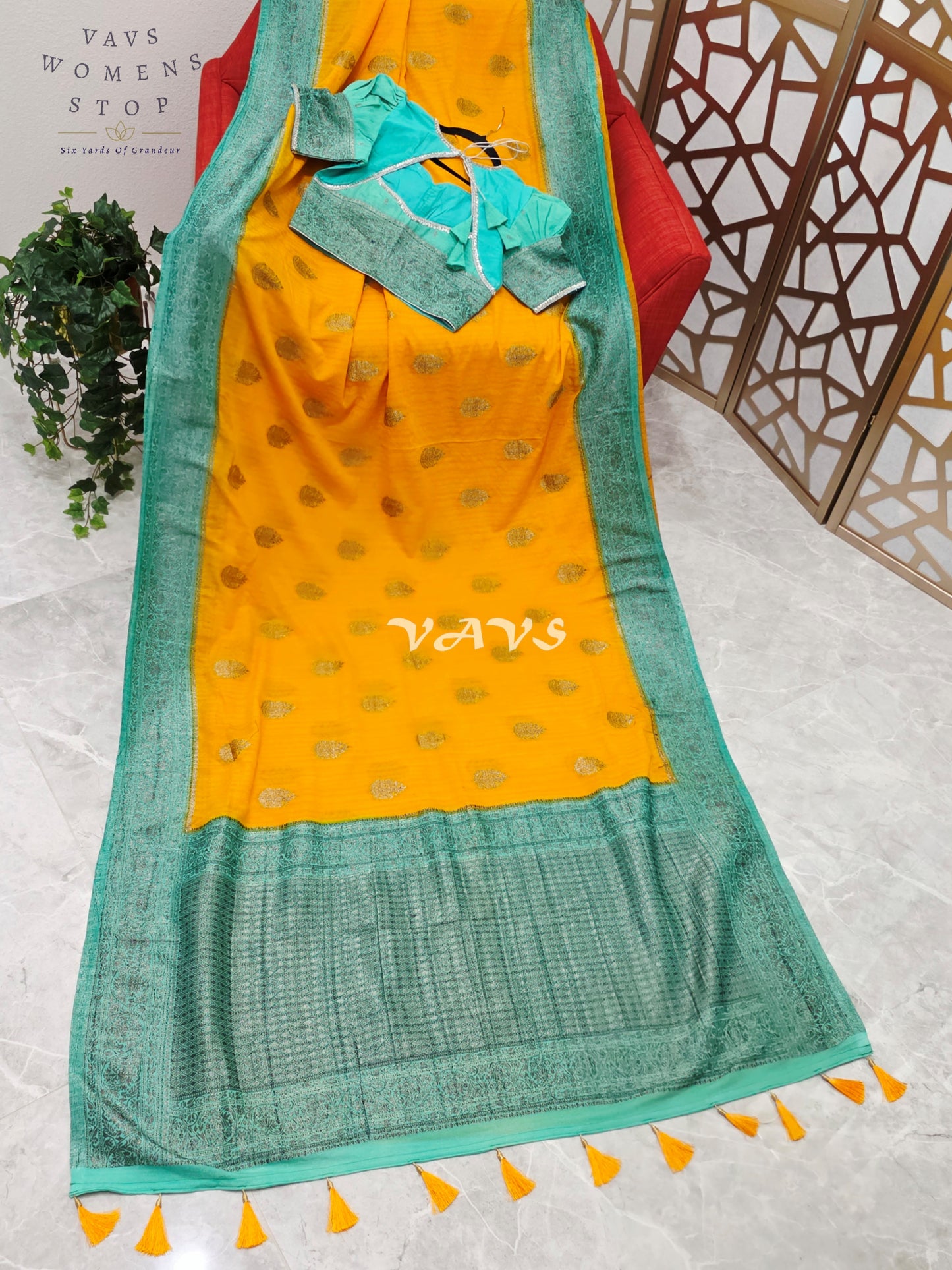 Regal Marigold & Turquoise Semi Tussar Georgette Saree with Antique Silver Zari Buttas & Puff-Sleeve Blouse