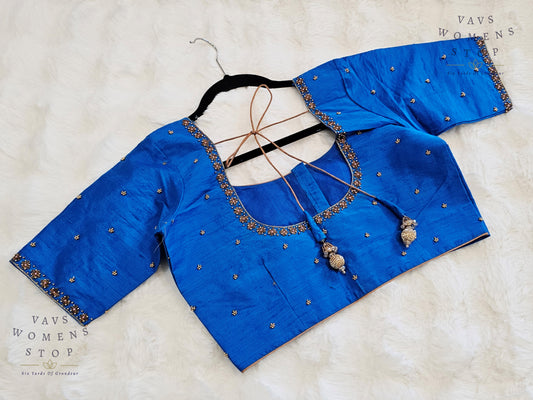 Blue Raw Silk Maggam Embroidery Blouse with Elbow Sleeves – USA Ready to Ship”

“Designer Blue Raw Silk Blouse Front Opening – Wedding & Party Wear USA”