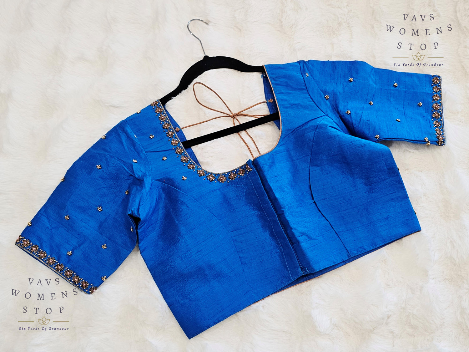 Blue Raw Silk Maggam Embroidery Blouse with Elbow Sleeves – USA Ready to Ship”

“Designer Blue Raw Silk Blouse Front Opening – Wedding & Party Wear USA”