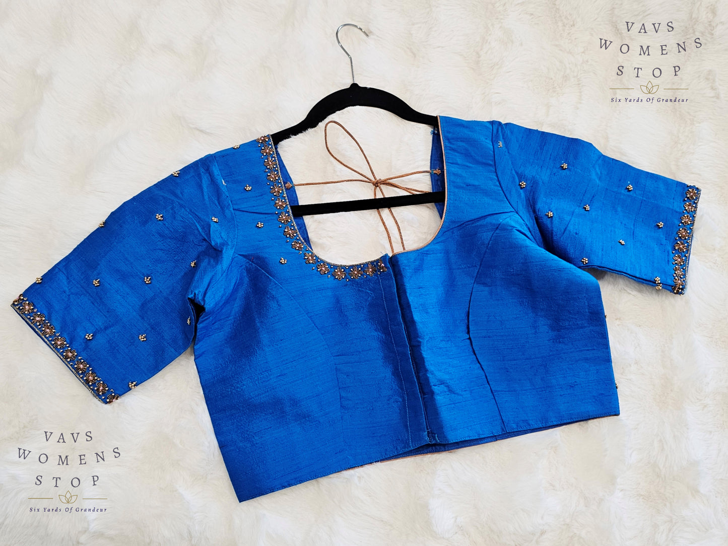 Blue Raw Silk Maggam Embroidery Blouse with Elbow Sleeves – USA Ready to Ship”

“Designer Blue Raw Silk Blouse Front Opening – Wedding & Party Wear USA”
