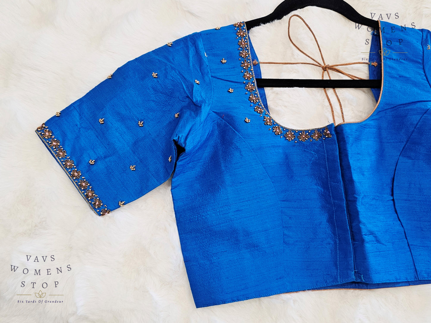 Blue Raw Silk Maggam Embroidery Blouse with Elbow Sleeves – USA Ready to Ship”

“Designer Blue Raw Silk Blouse Front Opening – Wedding & Party Wear USA”
