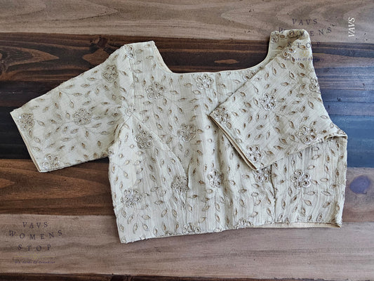 Shop elegant light gold tissue Hakoba cutwork blouse in size 38 extendable to 44. Perfect for sarees, lehengas, festive occasions & weddings. Ready to ship from USA.