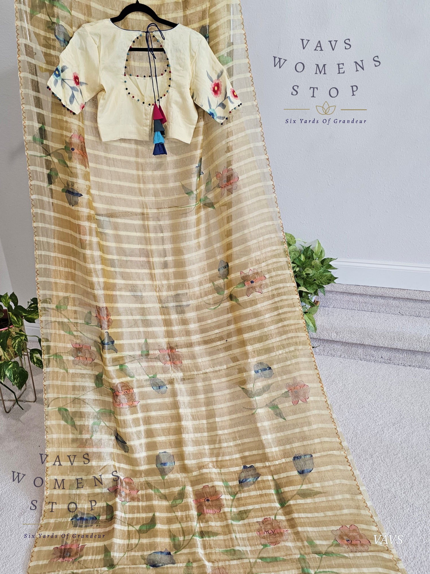 Shop pure tissue soft organza saree with gold stripes & floral print. Comes with blouse size 36 extendable to 42. Elegant party & wedding saree, ready to ship from Prosper, Texas, USA.