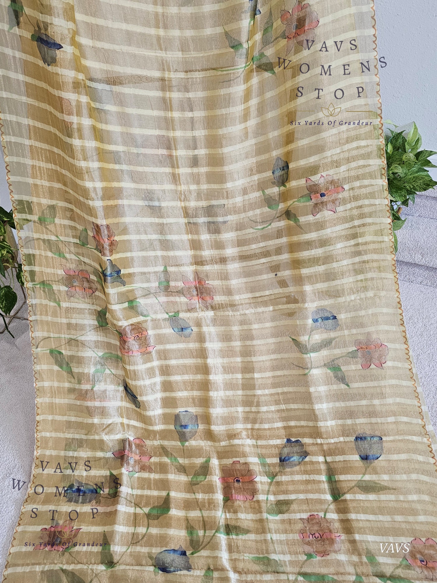 Shop pure tissue soft organza saree with gold stripes & floral print. Comes with blouse size 36 extendable to 42. Elegant party & wedding saree, ready to ship from Prosper, Texas, USA.