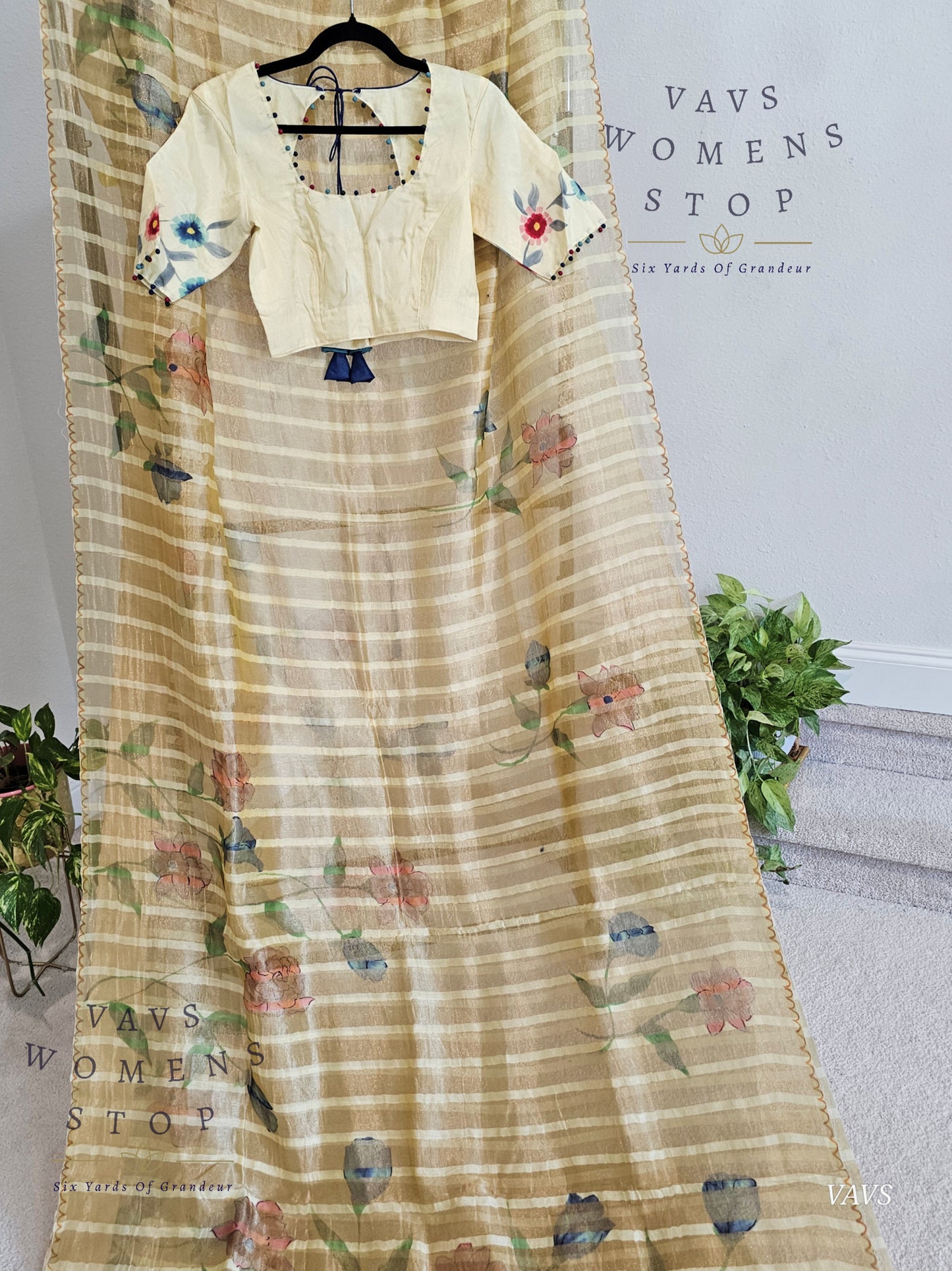 Shop pure tissue soft organza saree with gold stripes & floral print. Comes with blouse size 36 extendable to 42. Elegant party & wedding saree, ready to ship from Prosper, Texas, USA.
