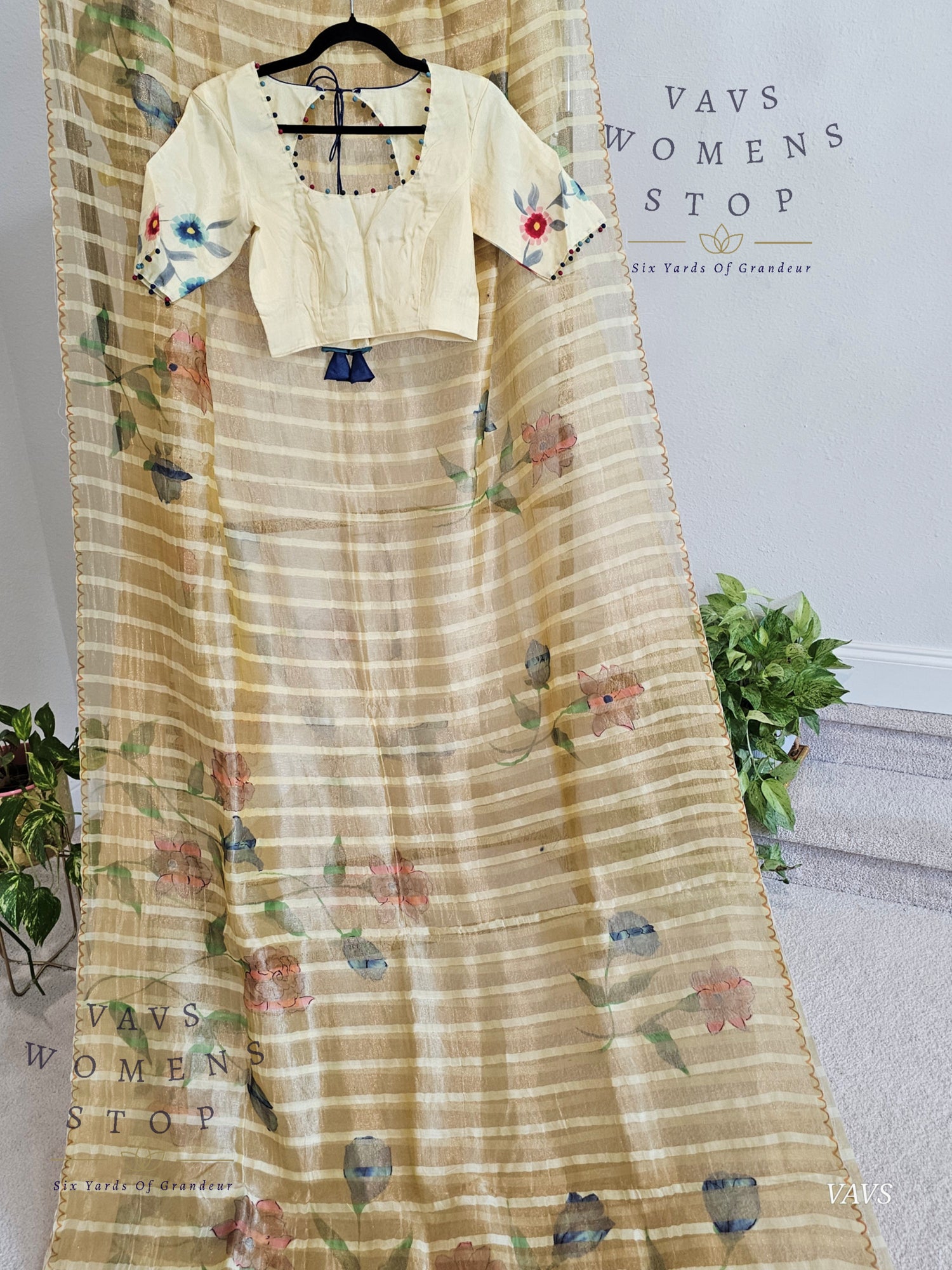 Shop pure tissue soft organza saree with gold stripes & floral print. Comes with blouse size 36 extendable to 42. Elegant party & wedding saree, ready to ship from Prosper, Texas, USA.