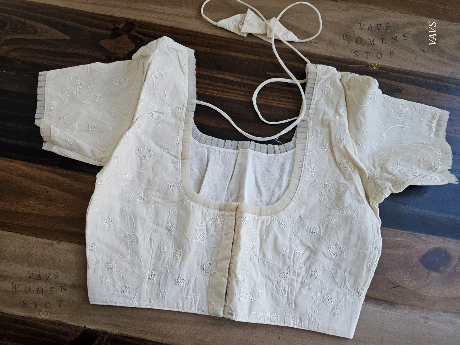Elegant Off-White Mul Cotton Blouse with Chikankari embroidery. Designer stitched saree blouse for wedding, party, and festive wear – USA ready.”