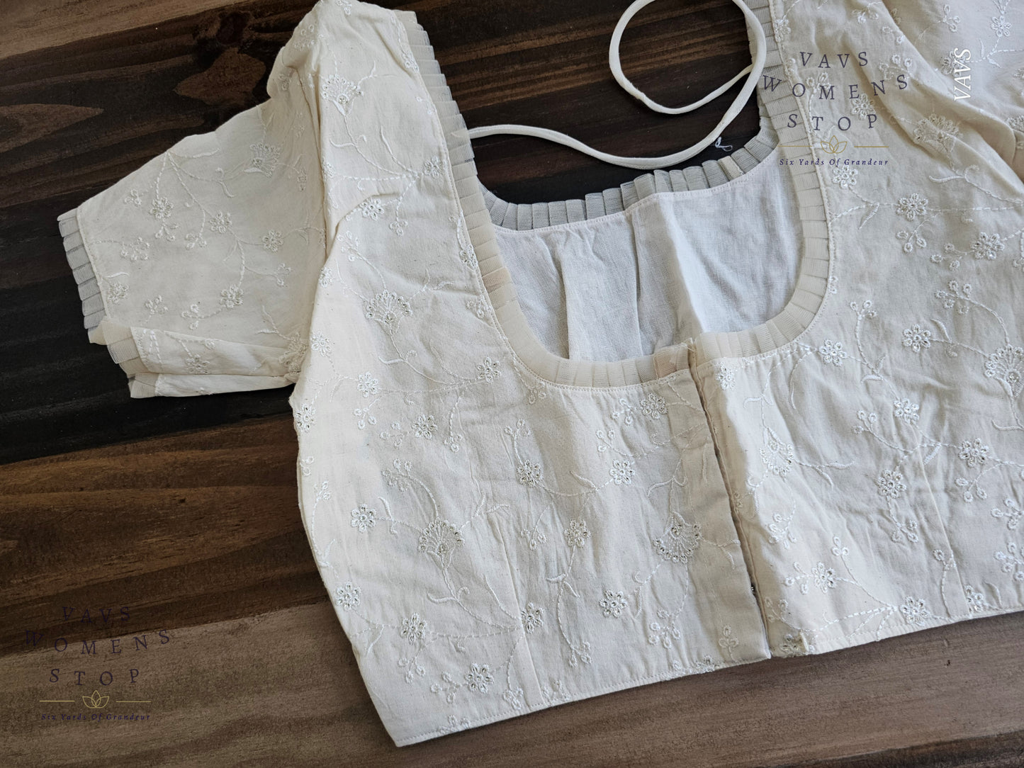 Elegant Off-White Mul Cotton Blouse with Chikankari embroidery. Designer stitched saree blouse for wedding, party, and festive wear – USA ready.”