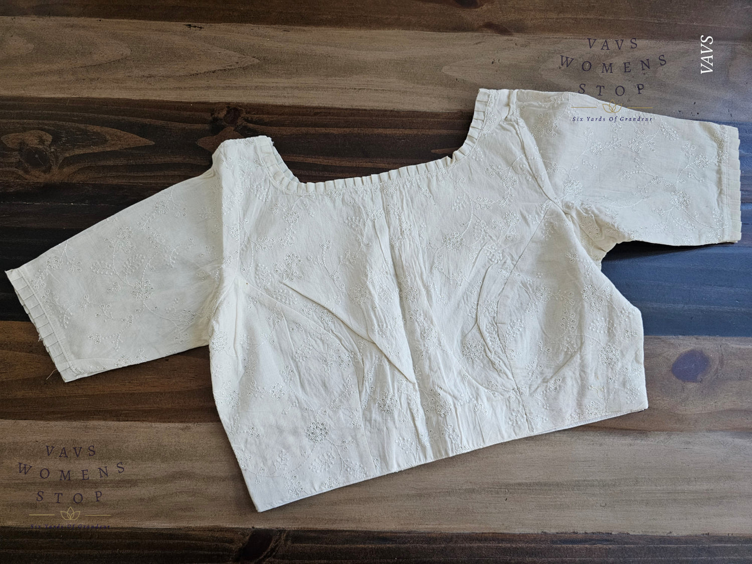 Elegant Off-White Mul Cotton Blouse with Chikankari embroidery. Designer stitched saree blouse for wedding, party, and festive wear – USA ready.”