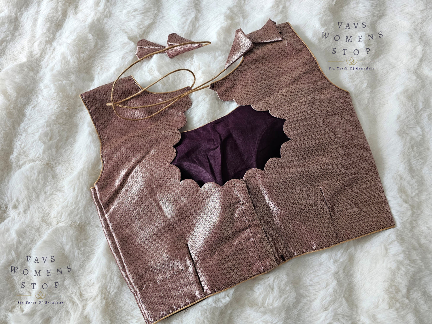 Shop stunning Wine Shade Sleeveless Benarasi Brocade Blouse with back opening & padded fit. Size 36, extendable up to 42. Perfect party wear blouse for sarees & lehengas.