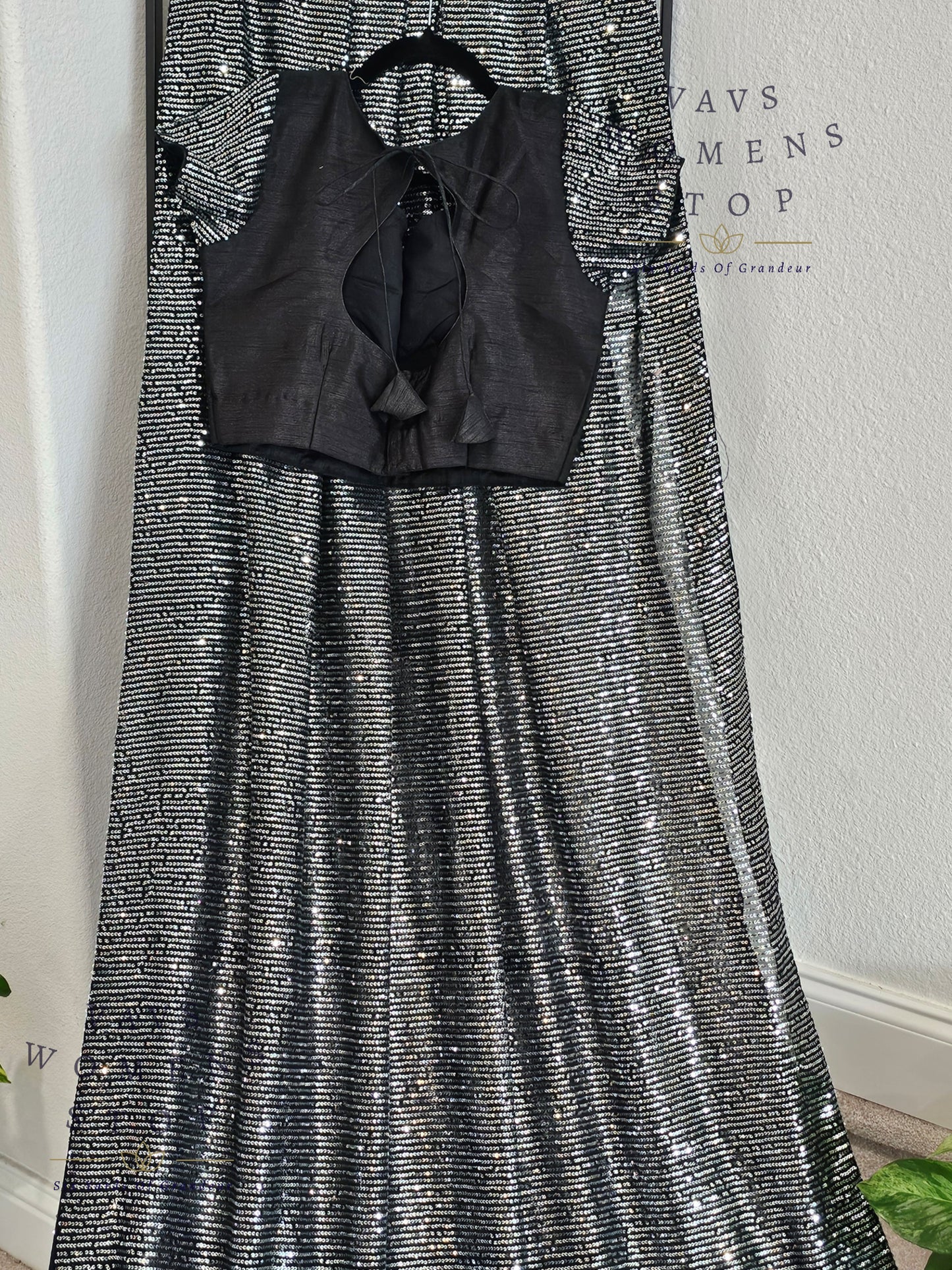 Elegant Black Net Saree adorned with shimmering silver sequins, paired with a designer blouse (size 36, extendable up to 42). Perfect for cocktail parties, receptions & evening events. Ready to ship.