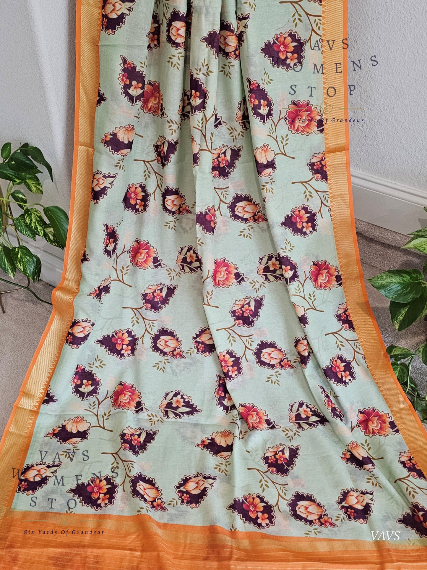 Floral Print Ruby Silk Saree in Pista Green with Orange Border & Matching Puff Sleeves Blouse