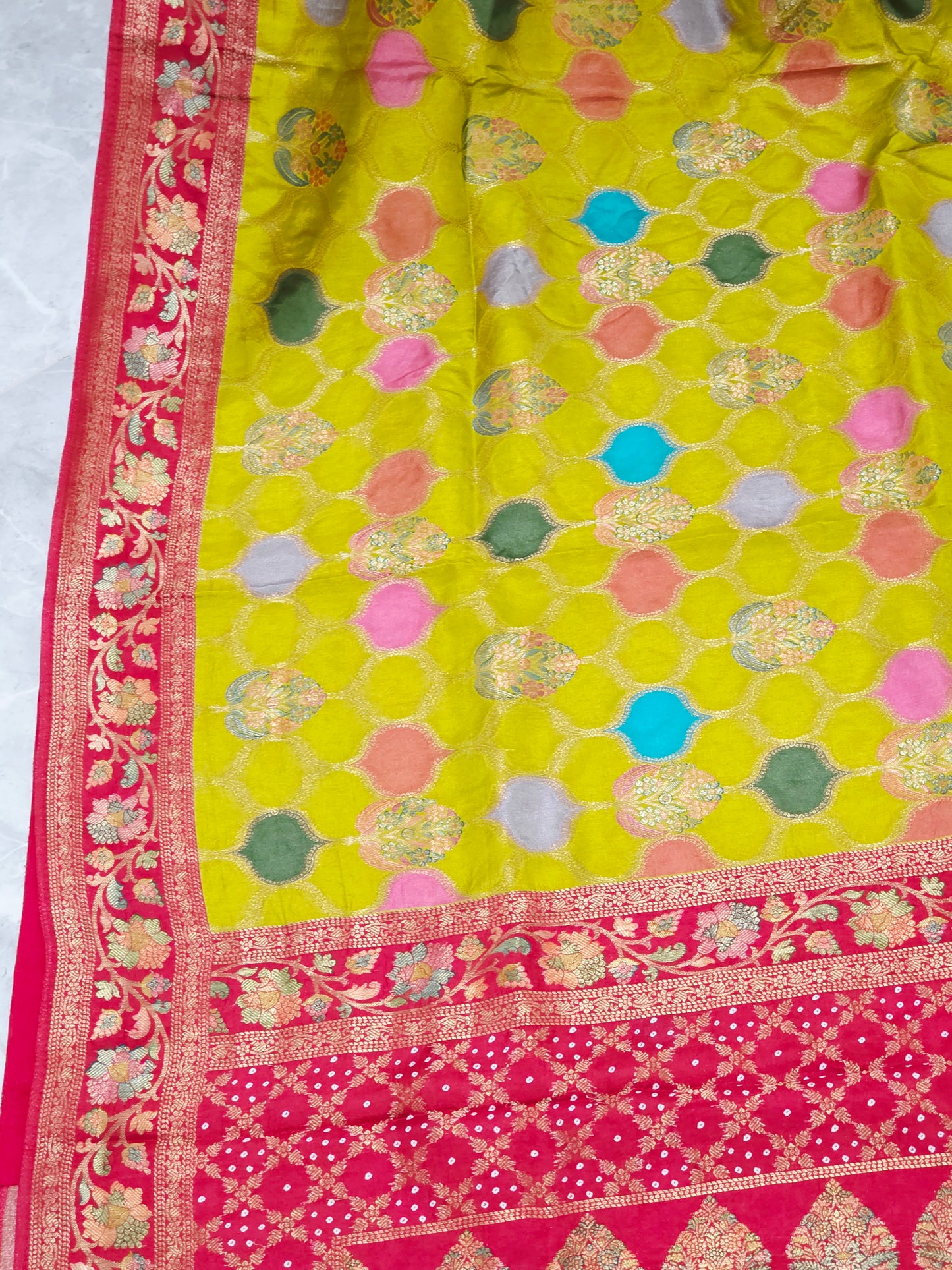Benarasi Soft Silk Mustard Yellow Saree with Multicolor Butta & Red Zari Border - Stitched Blouse