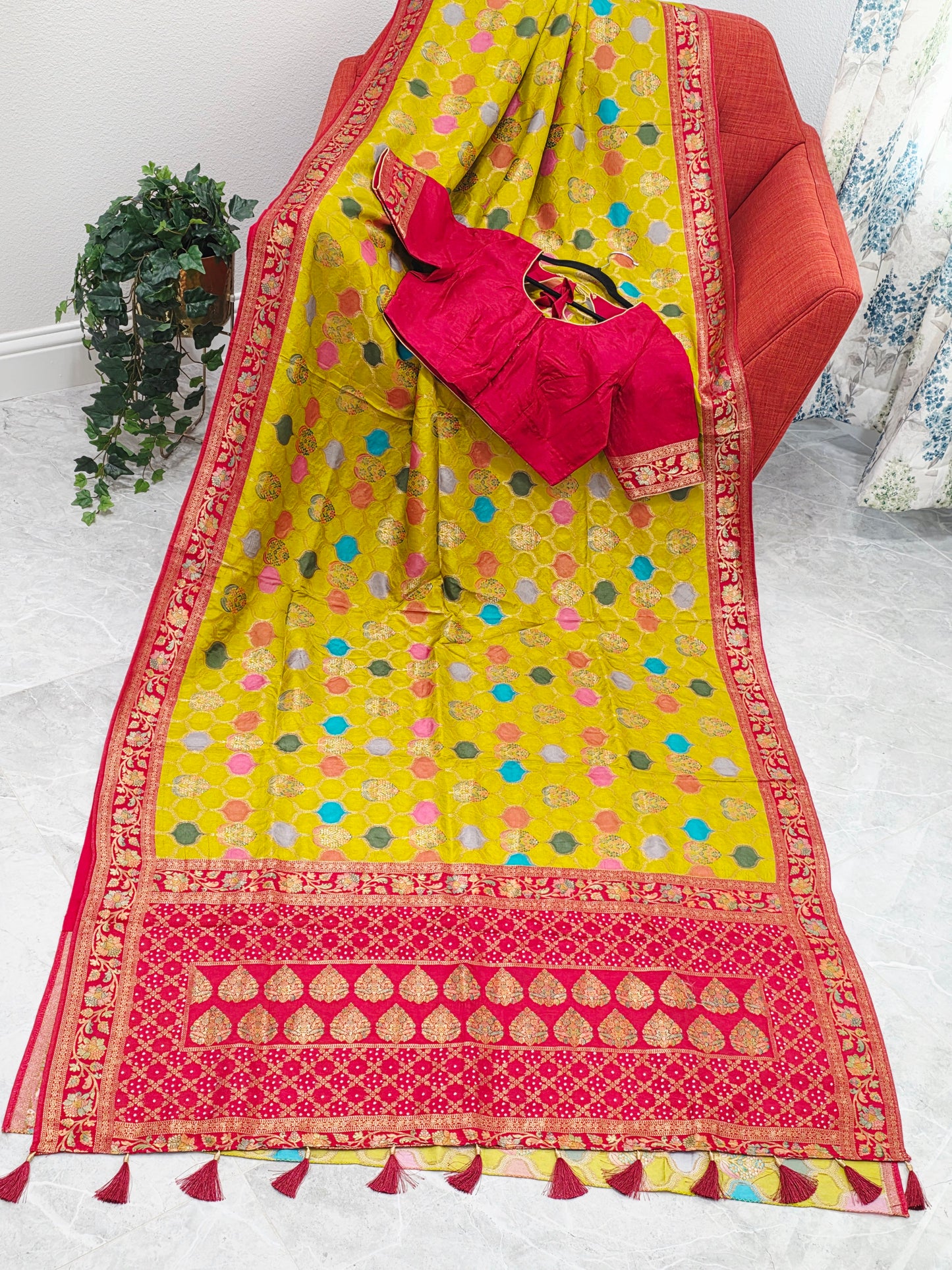 Benarasi Soft Silk Mustard Yellow Saree with Multicolor Butta & Red Zari Border - Stitched Blouse