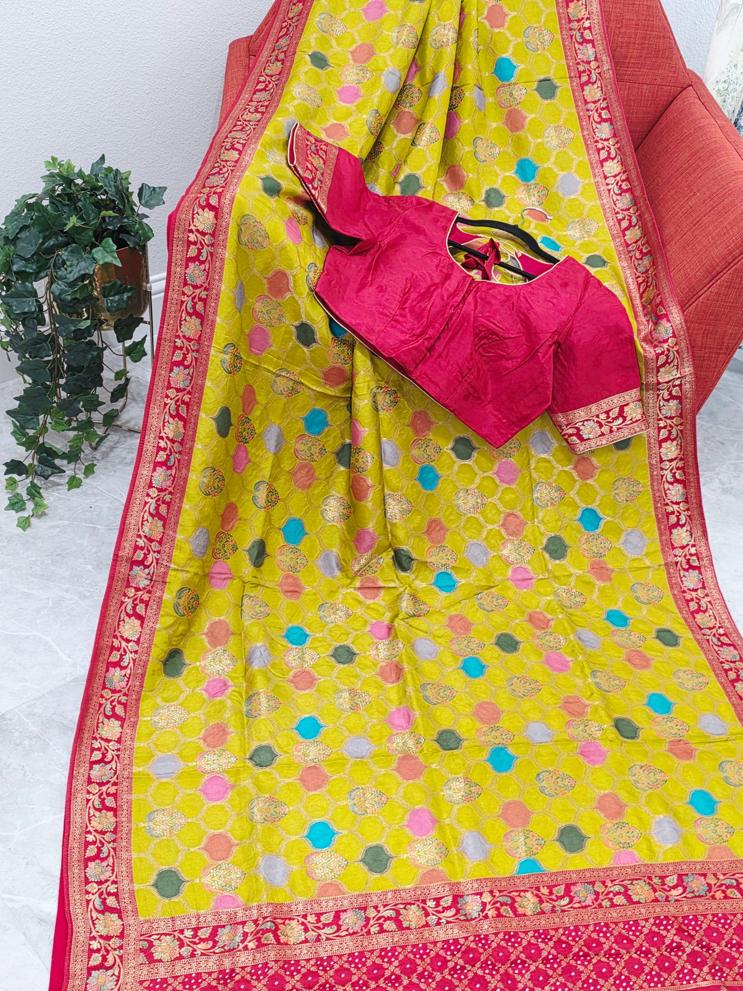 Benarasi Soft Silk Mustard Yellow Saree with Multicolor Butta & Red Zari Border - Stitched Blouse
