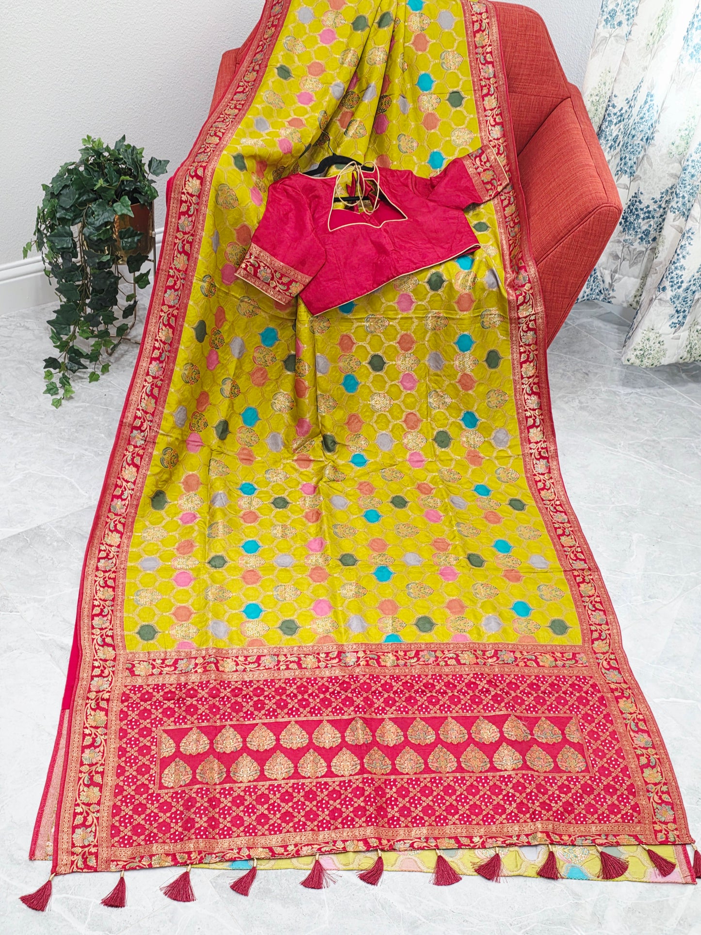 Benarasi Soft Silk Mustard Yellow Saree with Multicolor Butta & Red Zari Border - Stitched Blouse