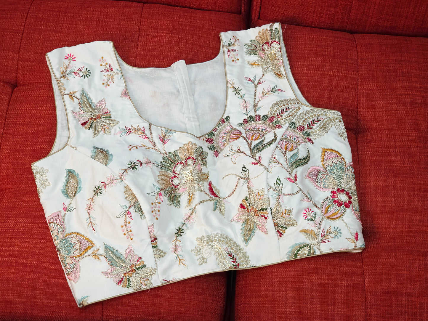 White Sleeveless Fancy Embroidered Blouse