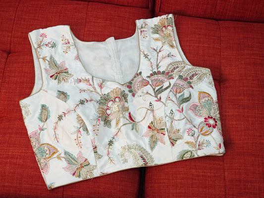 White Sleeveless Fancy Embroidered Blouse