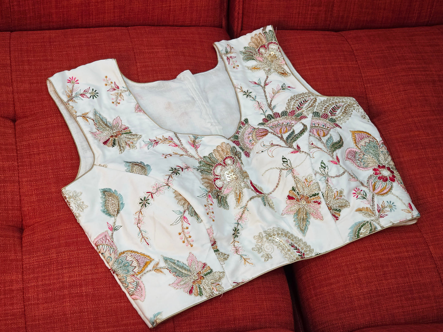 White Sleeveless Fancy Embroidered Blouse