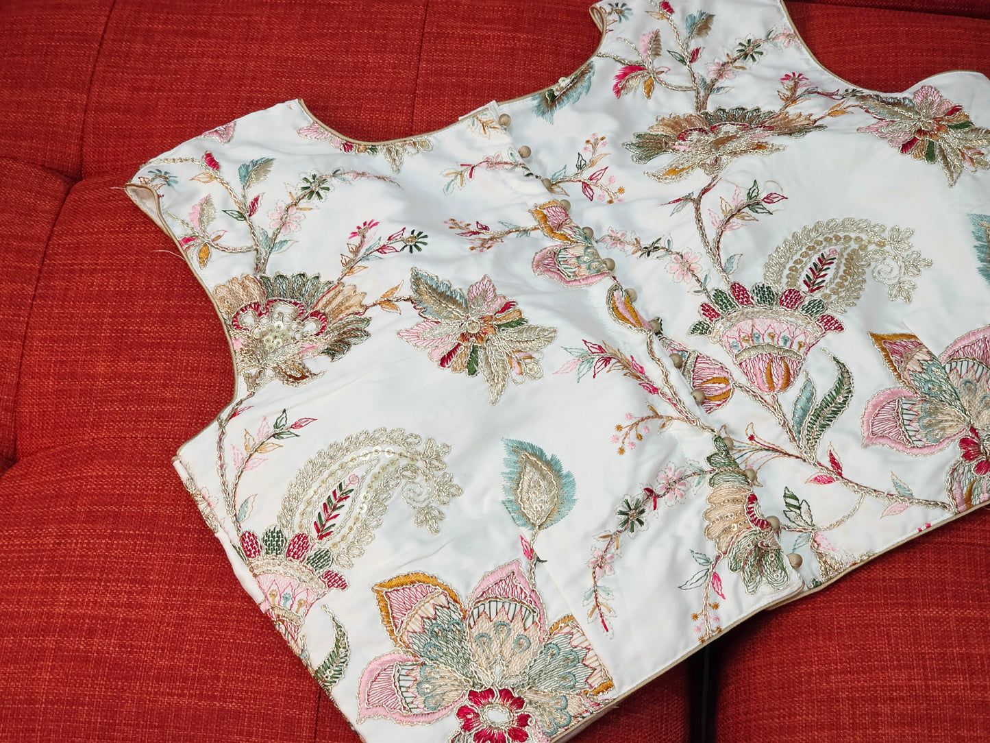 White Sleeveless Fancy Embroidered Blouse
