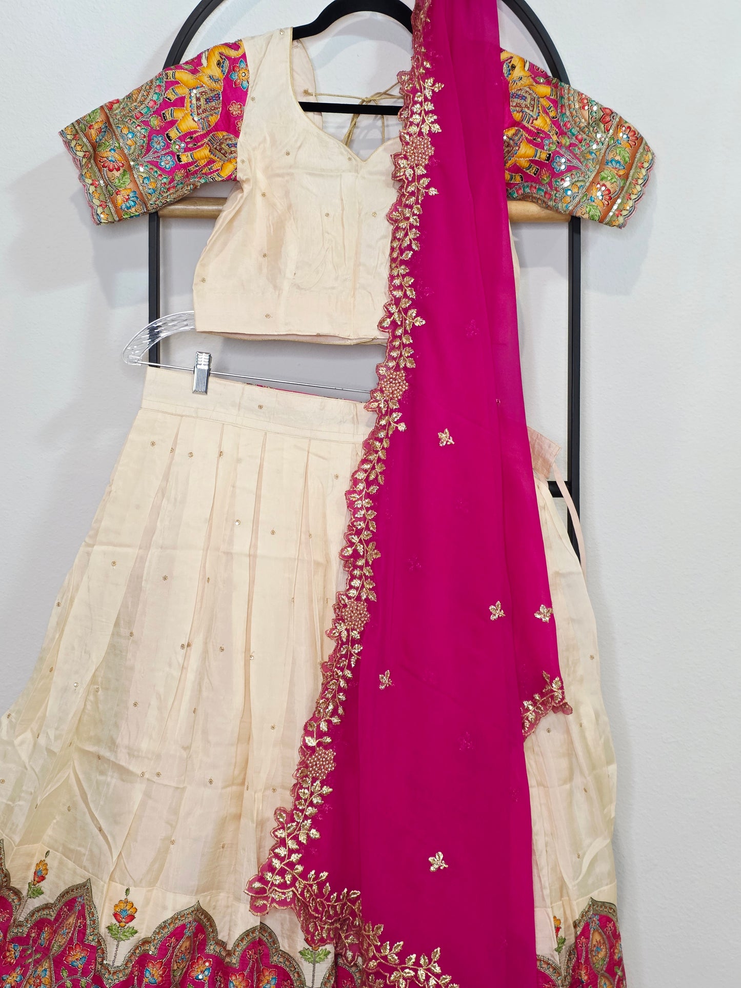 Ivory Champagne Munga Crepe Silk Lehenga with Royal Magenta Kalamkari Border & Embroidered Cutwork Dupatta
