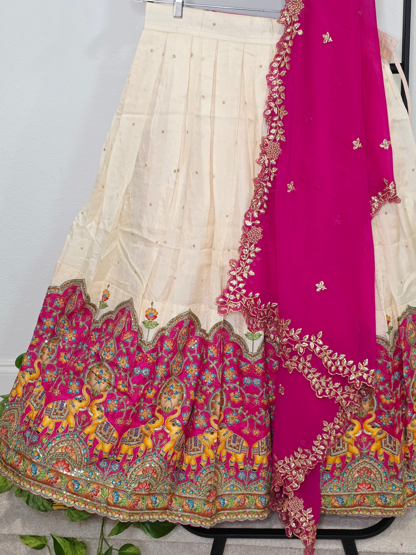 Ivory Champagne Munga Crepe Silk Lehenga with Royal Magenta Kalamkari Border & Embroidered Cutwork Dupatta