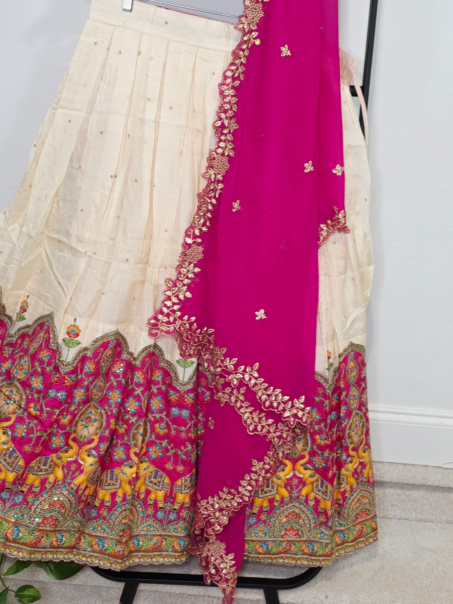 Ivory Champagne Munga Crepe Silk Lehenga with Royal Magenta Kalamkari Border & Embroidered Cutwork Dupatta