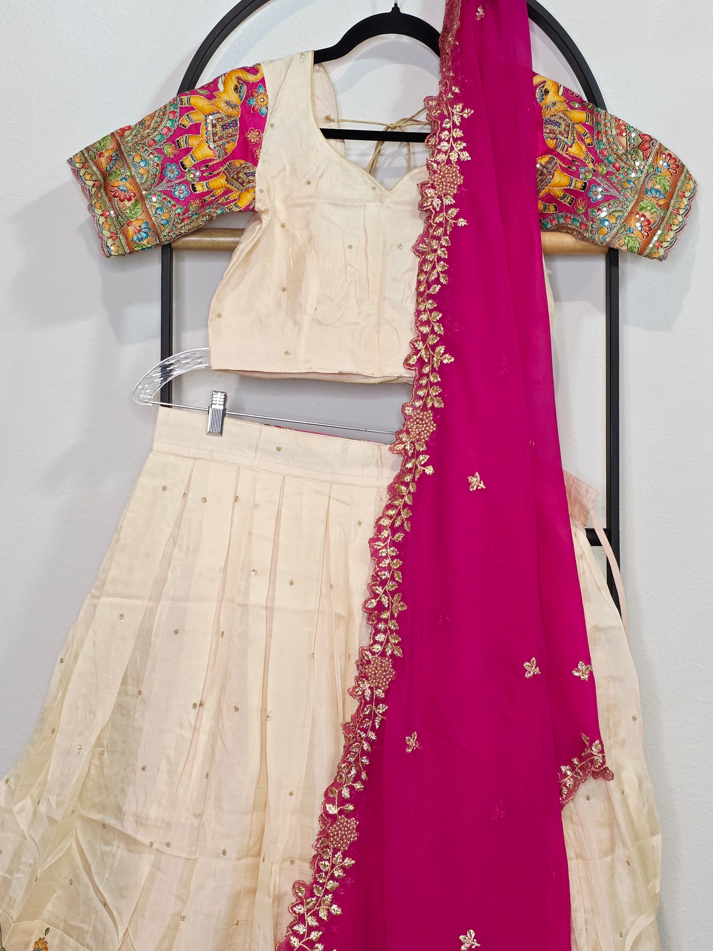 Ivory Champagne Munga Crepe Silk Lehenga with Royal Magenta Kalamkari Border & Embroidered Cutwork Dupatta