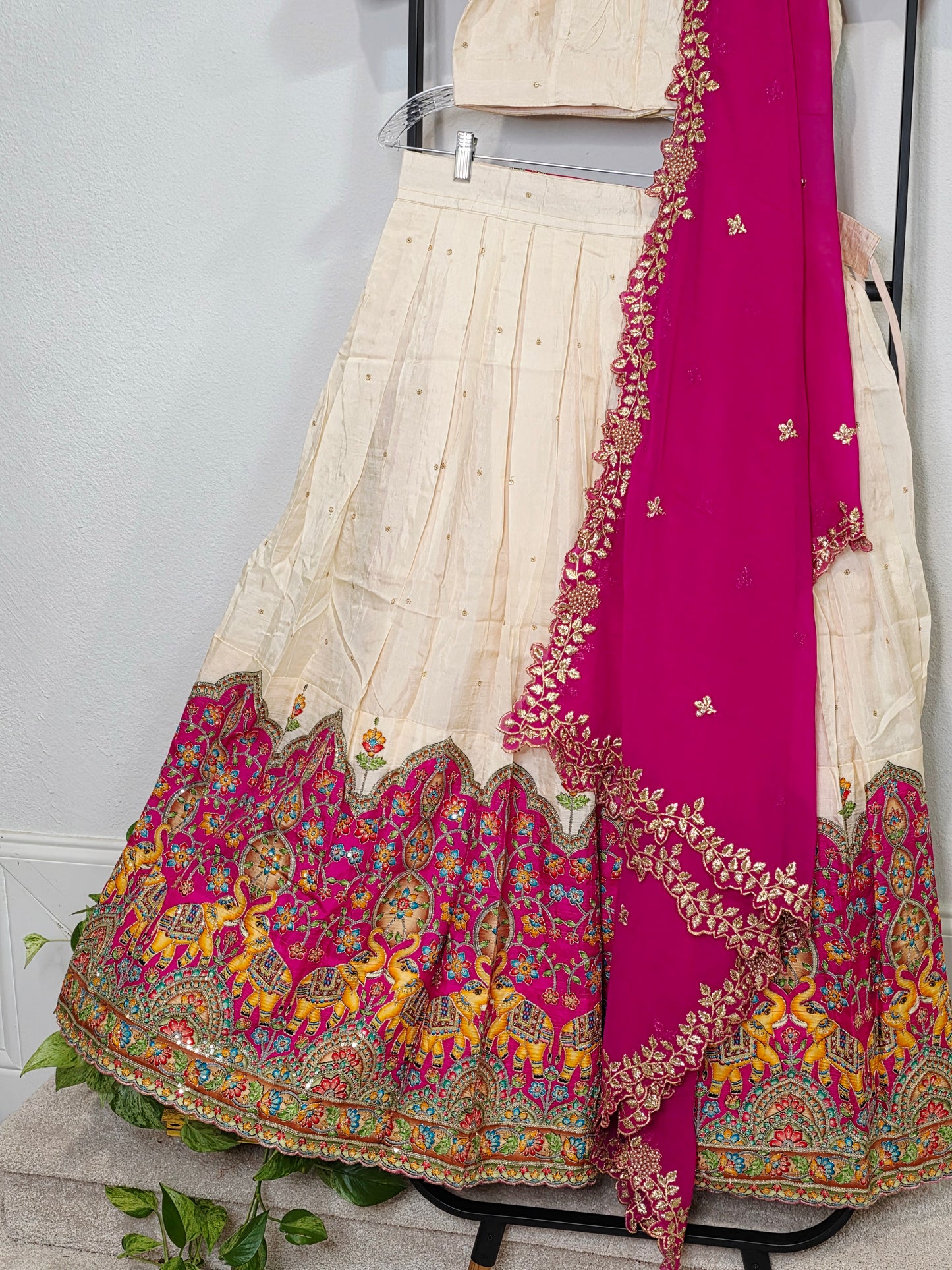 Ivory Champagne Munga Crepe Silk Lehenga with Royal Magenta Kalamkari Border & Embroidered Cutwork Dupatta