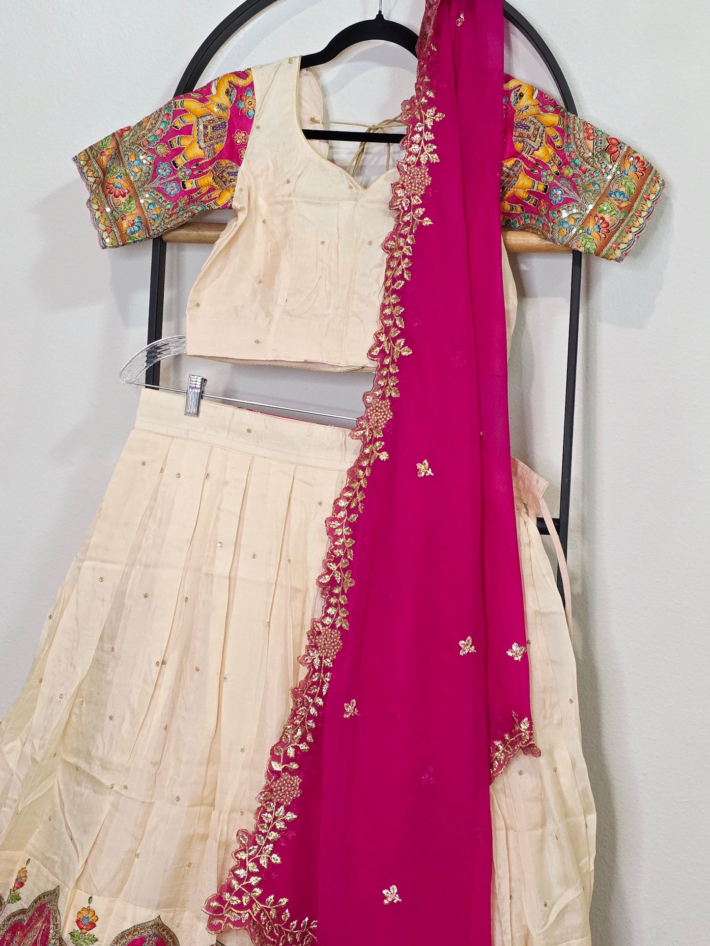 Ivory Champagne Munga Crepe Silk Lehenga with Royal Magenta Kalamkari Border & Embroidered Cutwork Dupatta