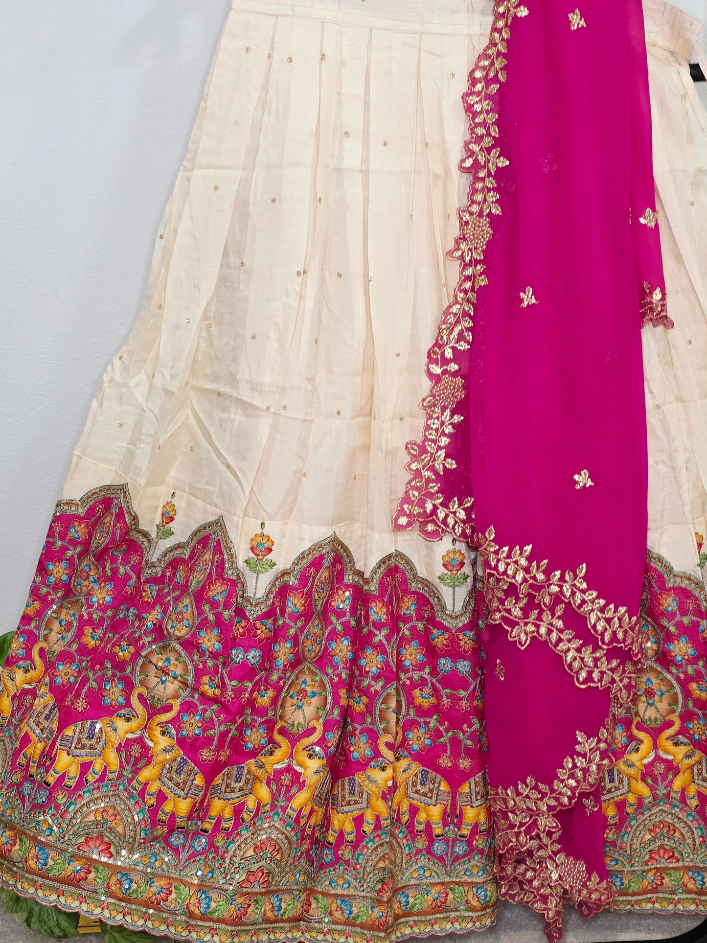 Ivory Champagne Munga Crepe Silk Lehenga with Royal Magenta Kalamkari Border & Embroidered Cutwork Dupatta