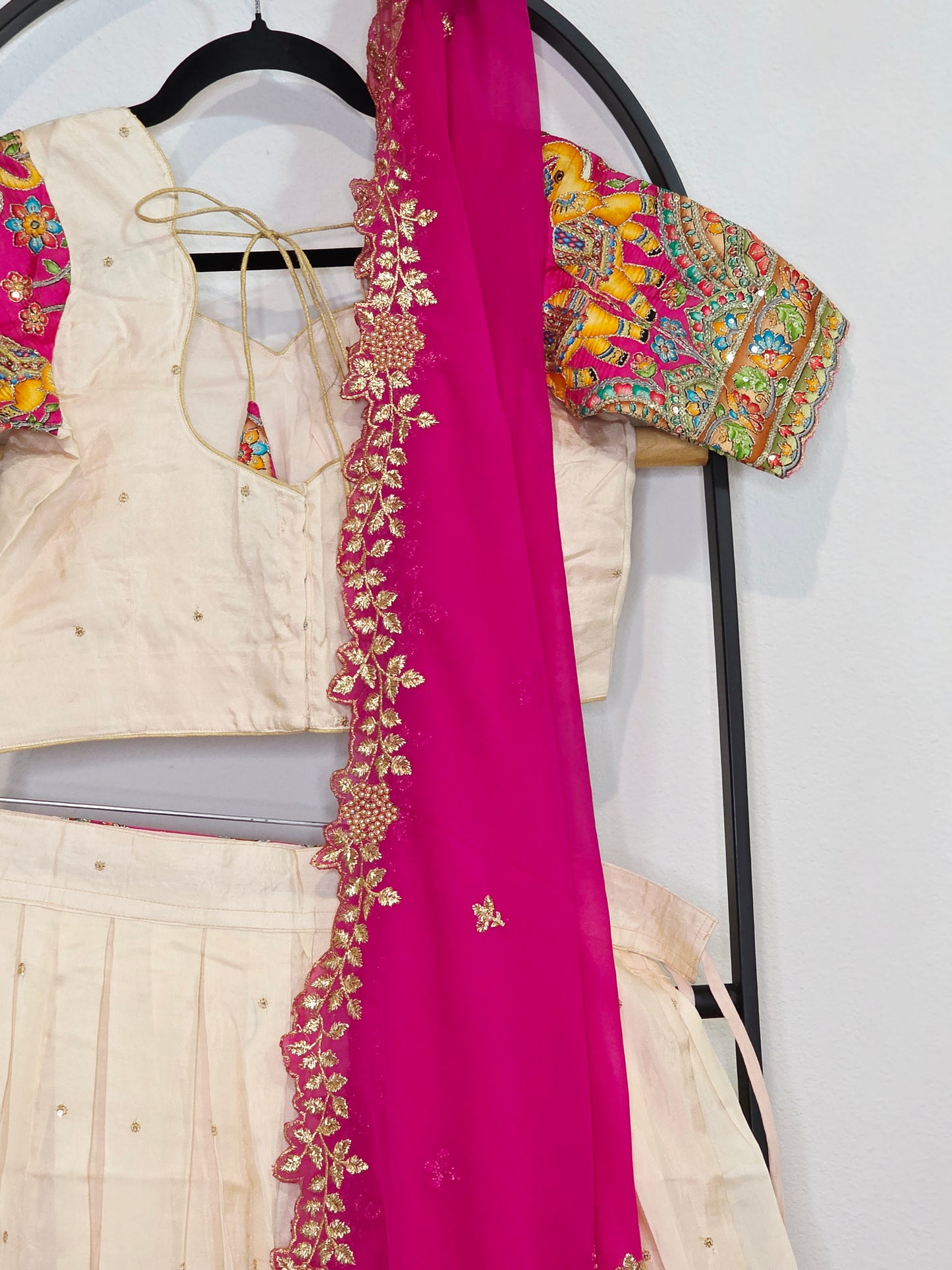 Ivory Champagne Munga Crepe Silk Lehenga with Royal Magenta Kalamkari Border & Embroidered Cutwork Dupatta