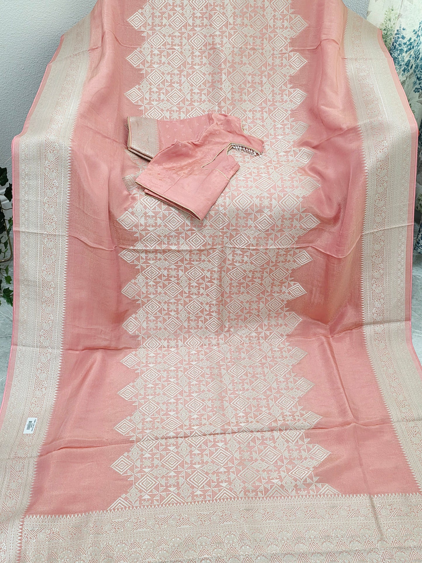 Pastel Coral Rose Soft Tissue Saree with Subtle Gold Geometry Center Design & Stitched Blouse