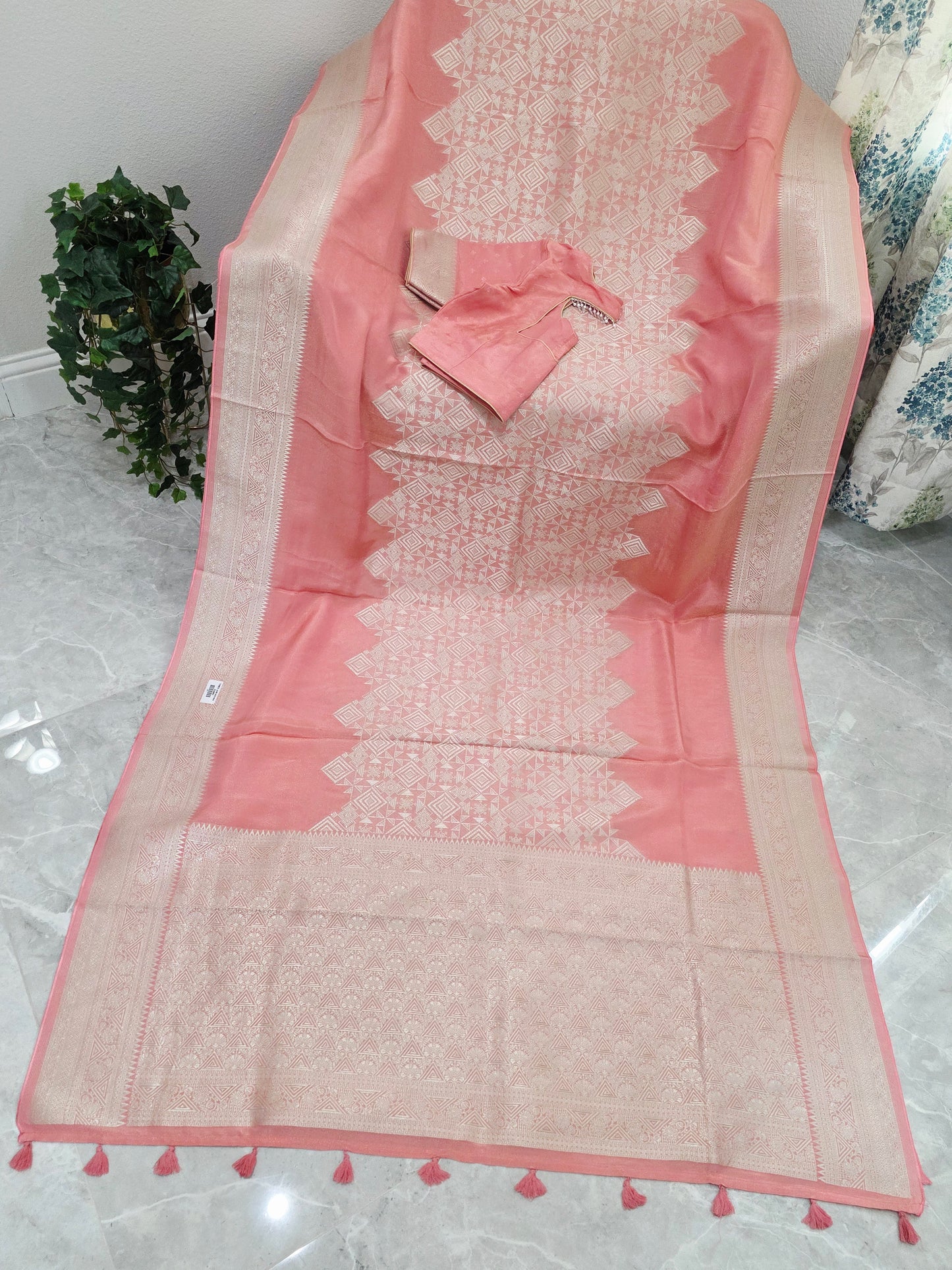 Pastel Coral Rose Soft Tissue Saree with Subtle Gold Geometry Center Design & Stitched Blouse