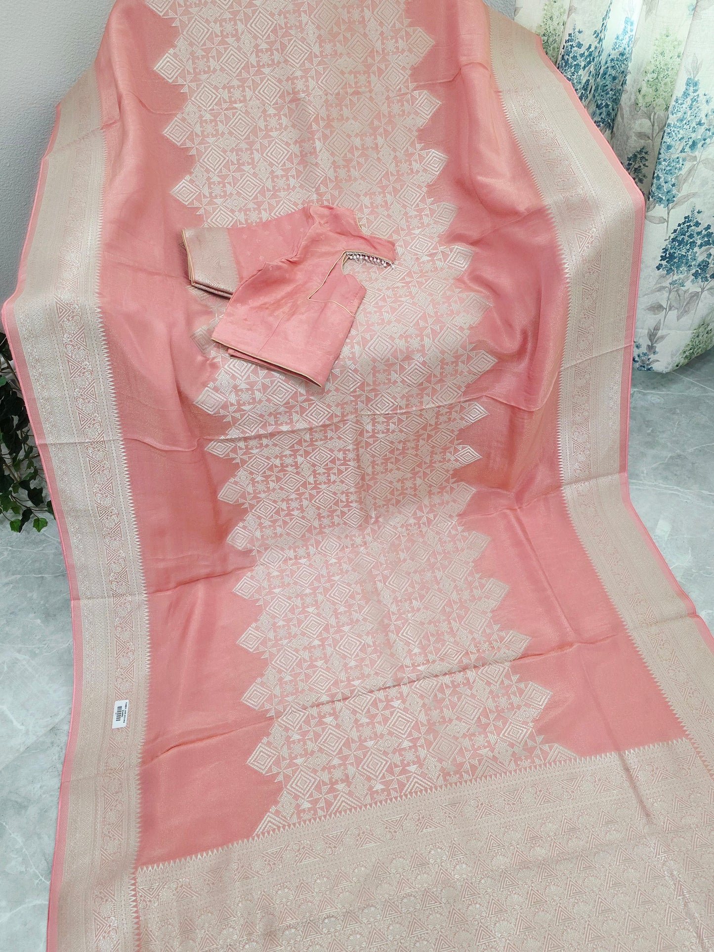 Pastel Coral Rose Soft Tissue Saree with Subtle Gold Geometry Center Design & Stitched Blouse