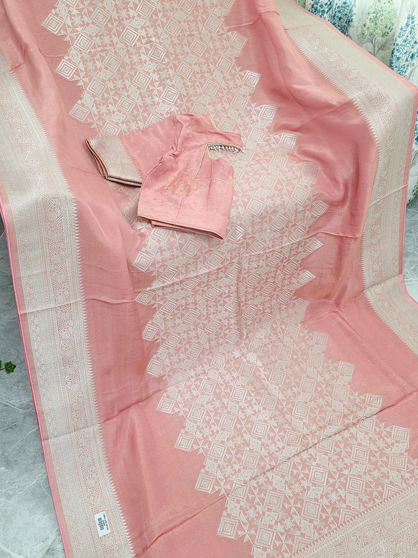 Pastel Coral Rose Soft Tissue Saree with Subtle Gold Geometry Center Design & Stitched Blouse