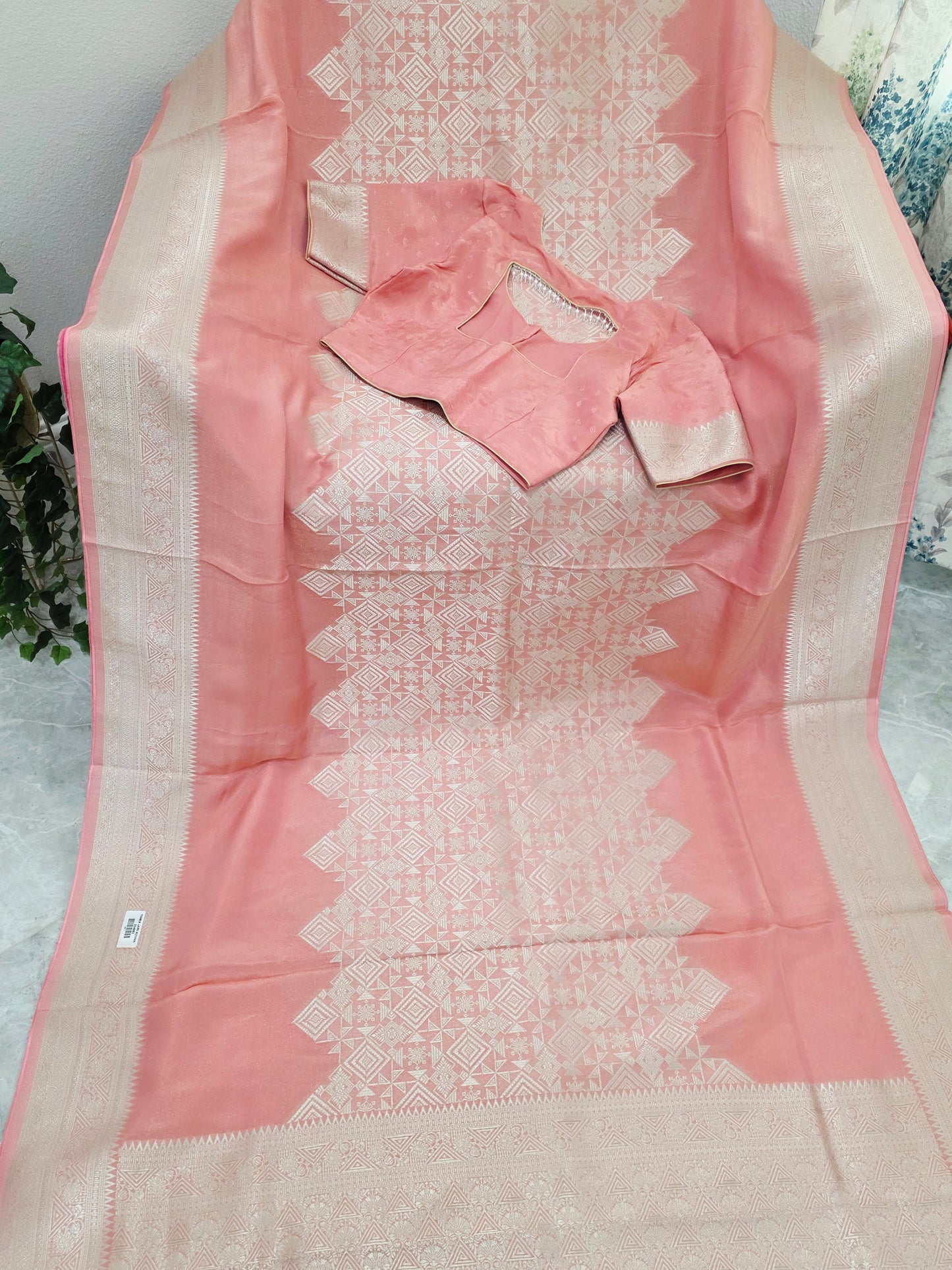 Pastel Coral Rose Soft Tissue Saree with Subtle Gold Geometry Center Design & Stitched Blouse