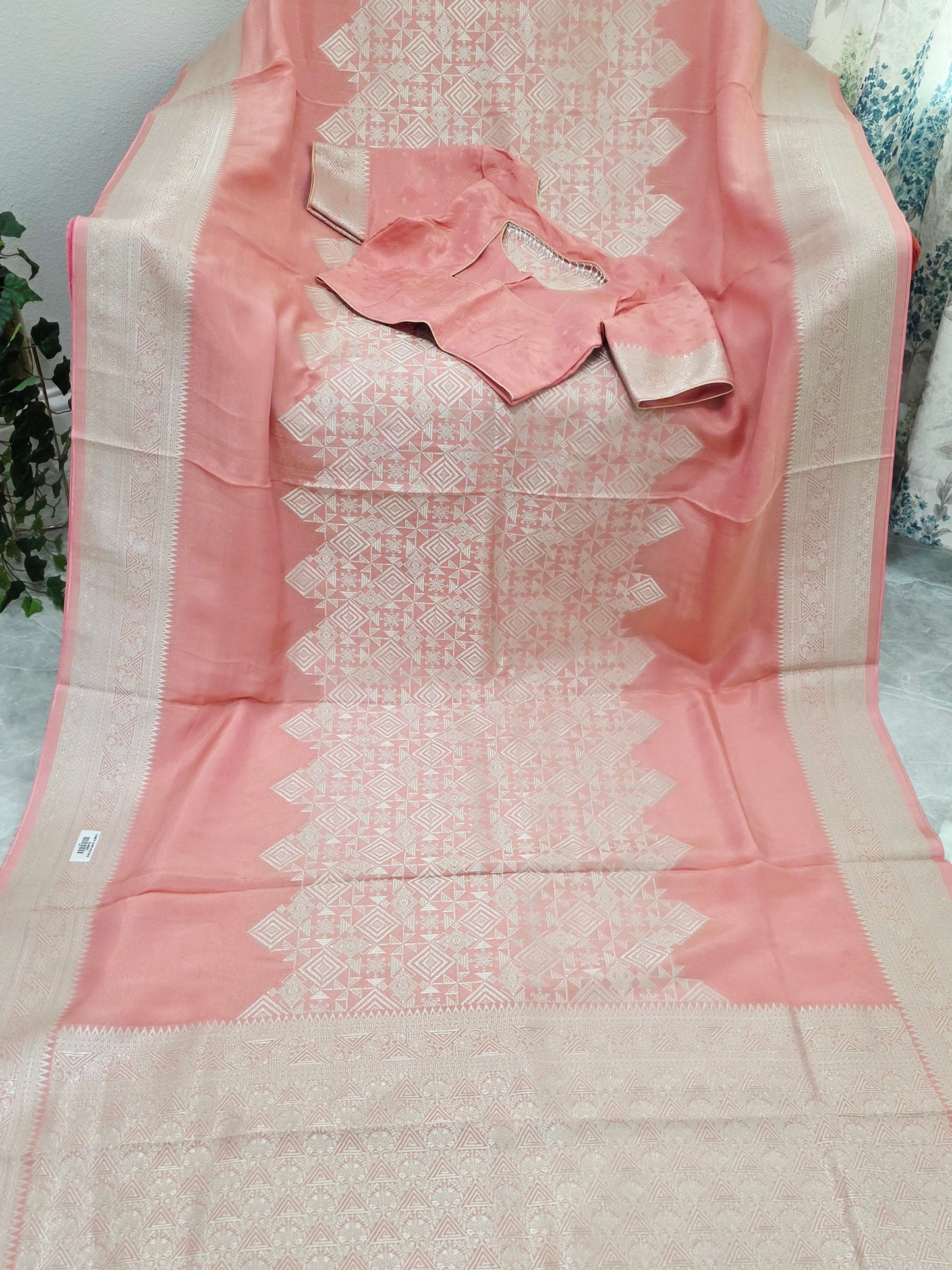 Pastel Coral Rose Soft Tissue Saree with Subtle Gold Geometry Center Design & Stitched Blouse