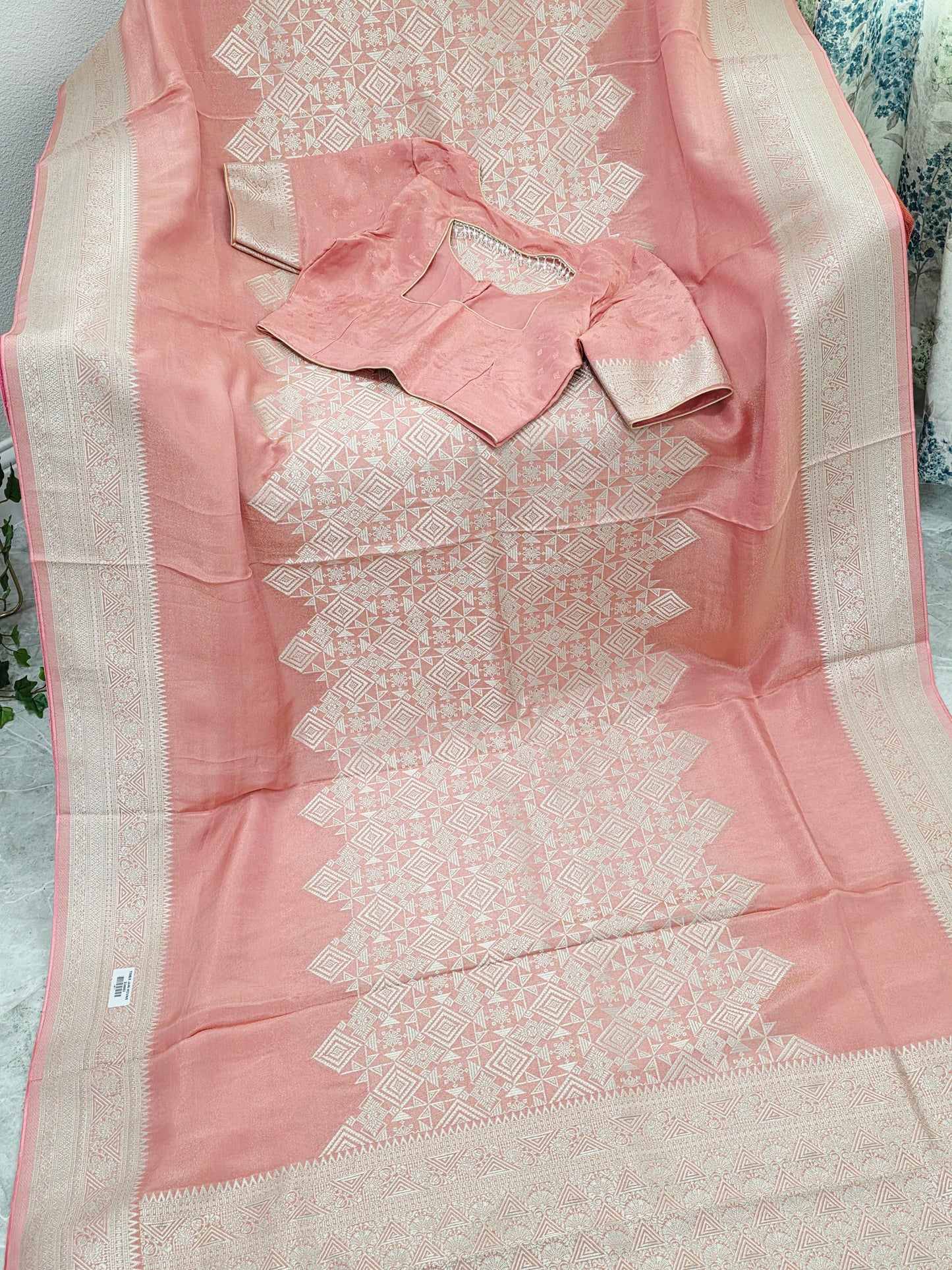 Pastel Coral Rose Soft Tissue Saree with Subtle Gold Geometry Center Design & Stitched Blouse
