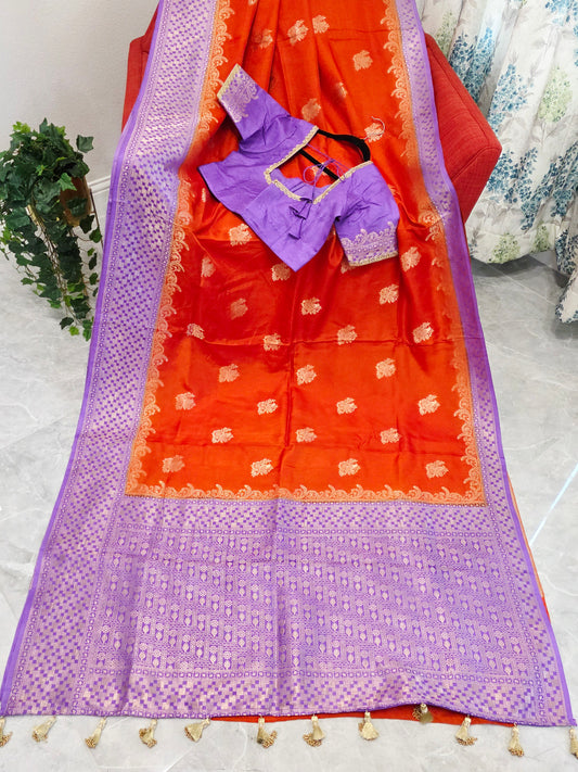 Saffron Orange Dola Benarasi Crepe Silk Saree with Lavender Border & Parrot Butta | Stitched Blouse