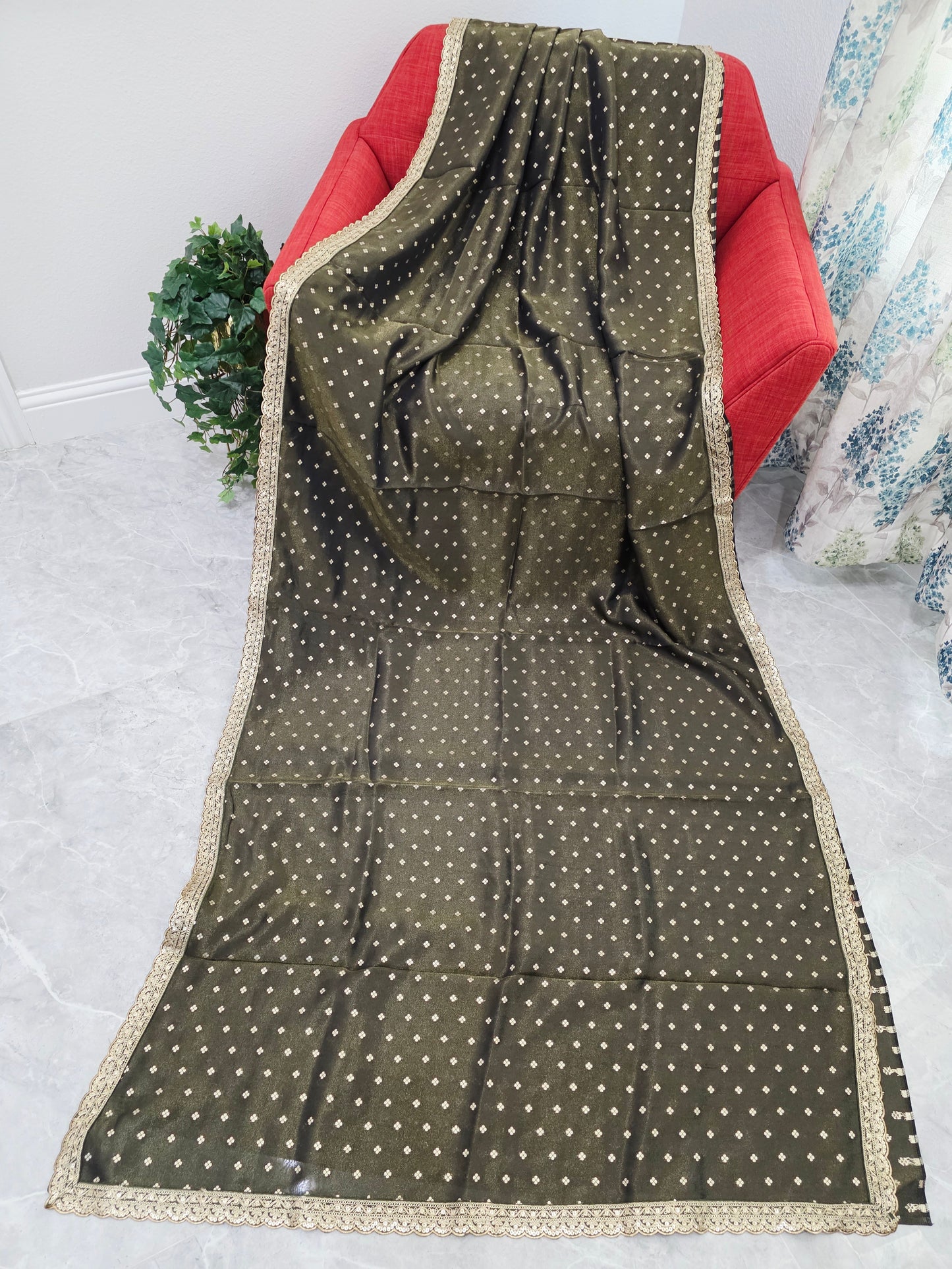 Luxury olive gold tissue saree with delicate all over butta and lace border