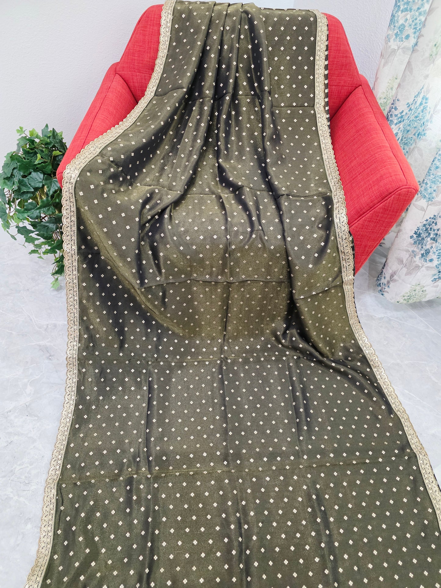 Luxury olive gold tissue saree with delicate all over butta and lace border