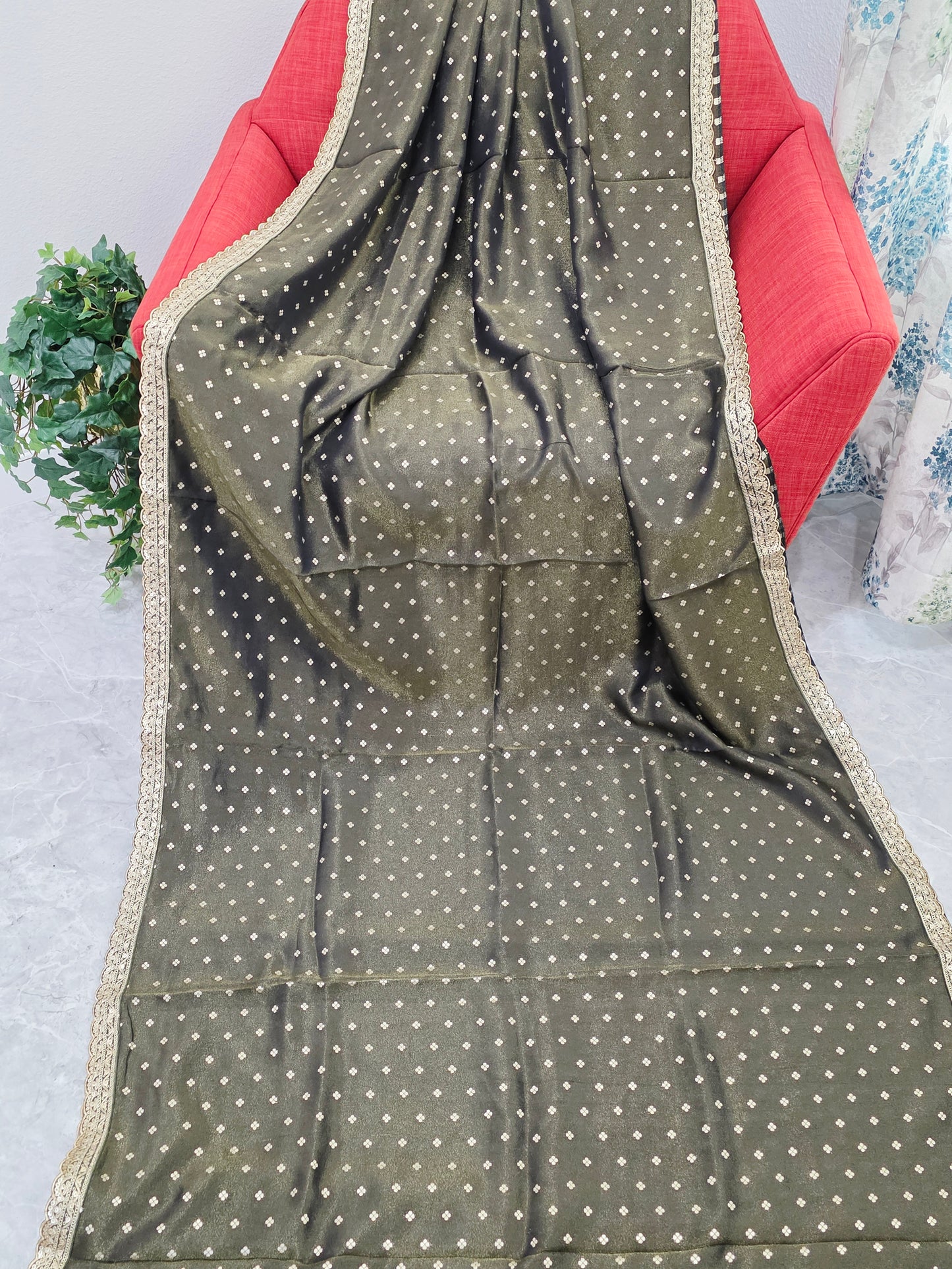 Luxury olive gold tissue saree with delicate all over butta and lace border