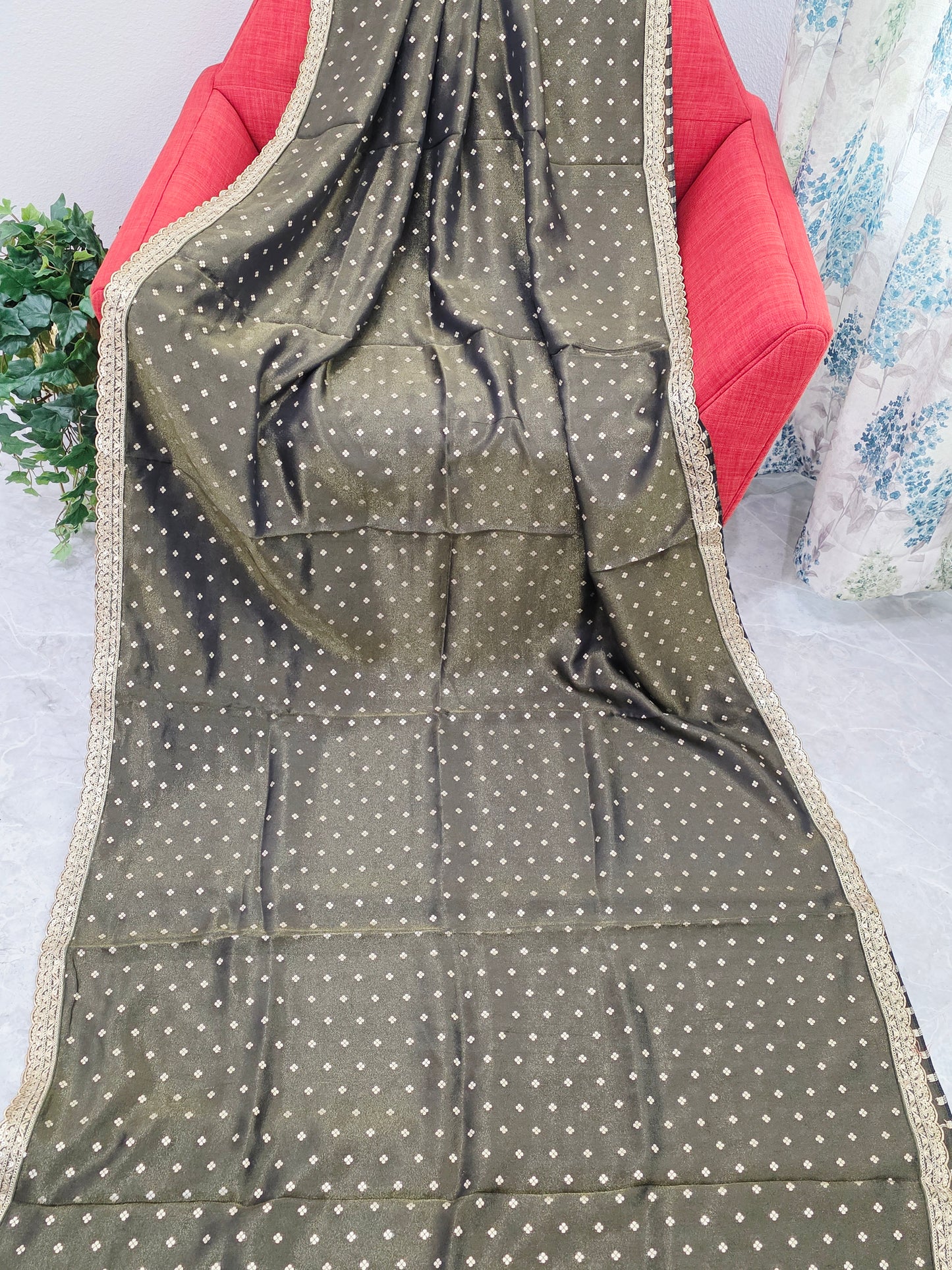 Luxury olive gold tissue saree with delicate all over butta and lace border
