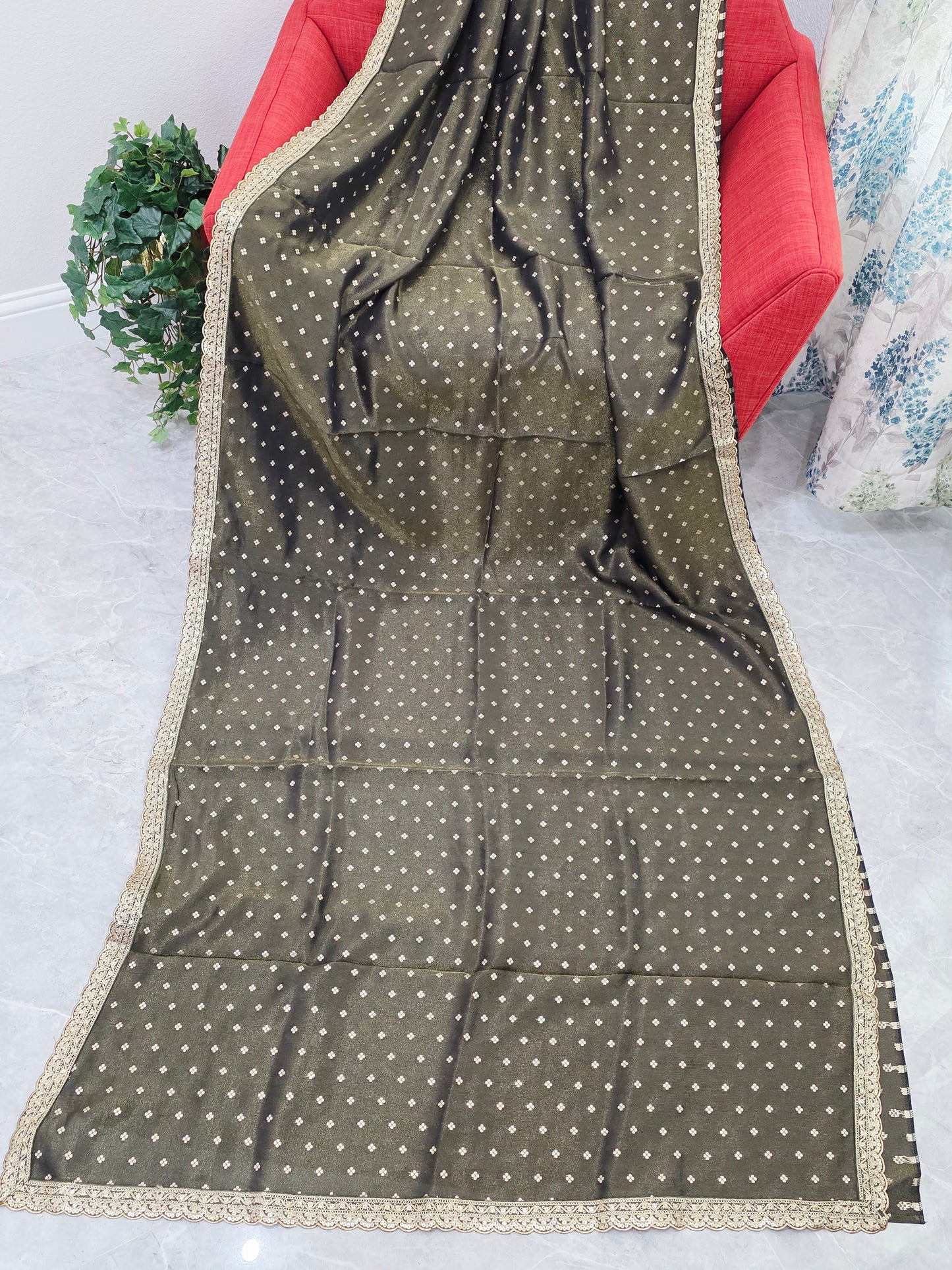 Luxury olive gold tissue saree with delicate all over butta and lace border